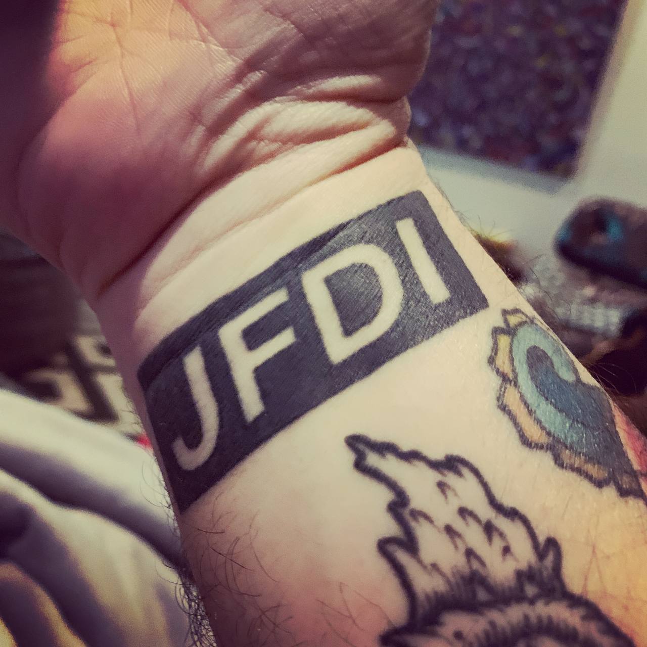 JFDI tattoo on my wrist